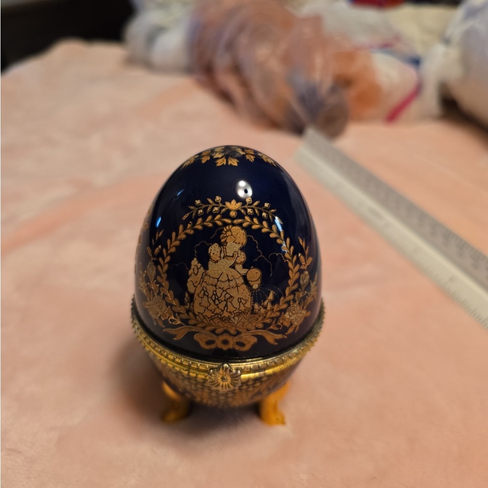 Elegant Blue and Gold Decorative Egg